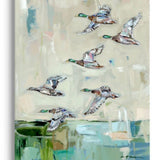 Mallards in flight